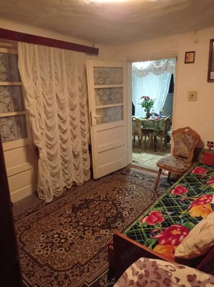 Casă cu 4 camere cu Teren 1018 Mp în Moțăieni