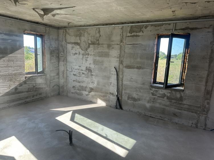 Casă cu Teren 600 Mp în Bujac