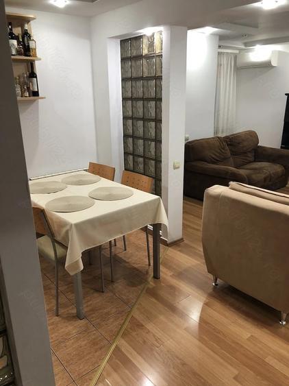 Apartament cu 4 camere decomandat în Central