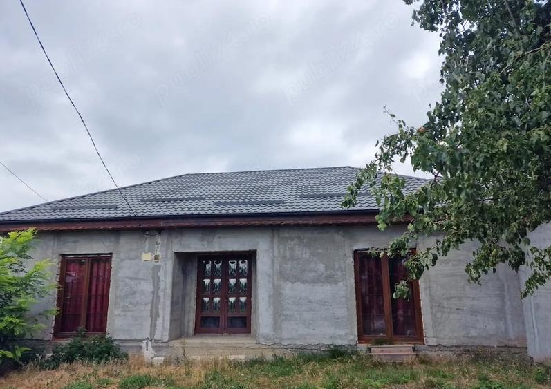 Casă cu Teren 1000 Mp în Central