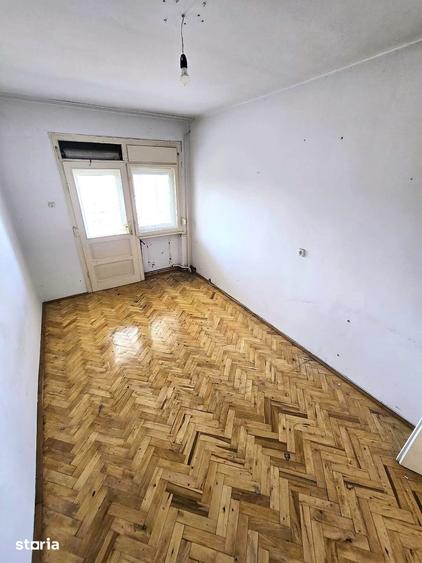Casă cu 4 camere cu Teren 420 Mp în Titulescu