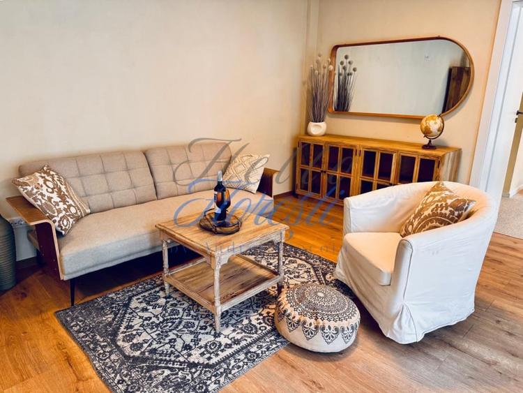 Apartament cu 3 camere semidecomandat, mobilat în Borhanci