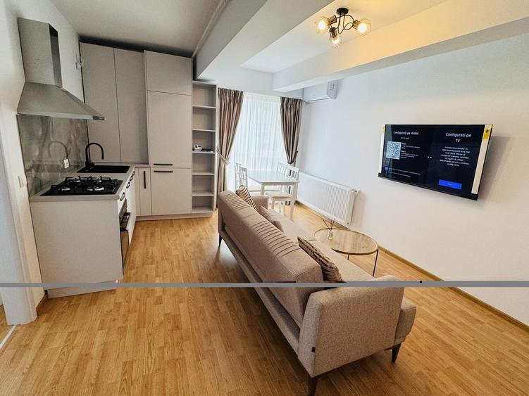 Apartament cu 2 camere semidecomandat, mobilat în Est
