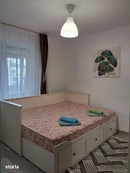 Apartament cu 2 camere, mobilat în Romană — fotografia 3