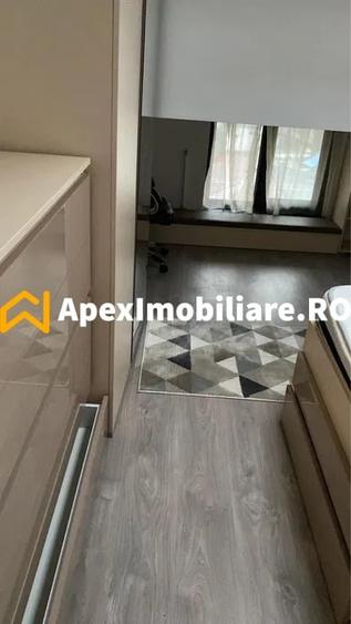Apartament cu 3 camere semidecomandat, mobilat în 1 Mai