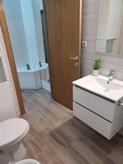 Apartament cu 2 camere decomandat, mobilat în Tractorul