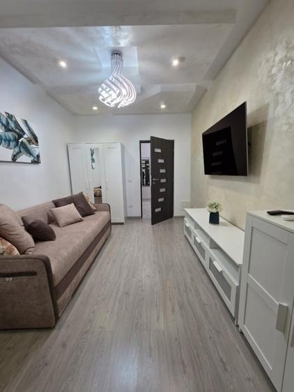 Apartament cu 2 camere decomandat în Podul de Fier