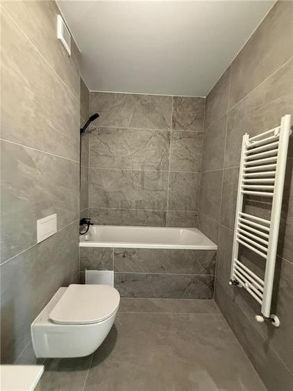 Apartament cu 3 camere decomandat în Torontalului