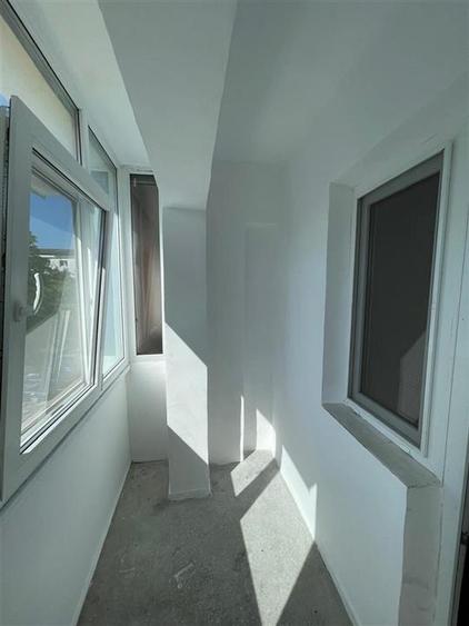 4 camere - etajul 2 - 86mp -izolat - bloc din 1980 - 9