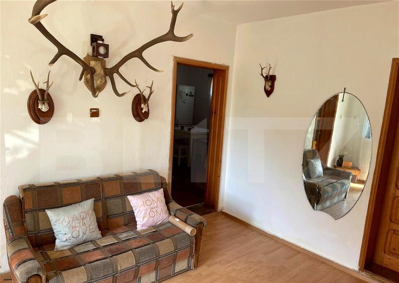 Casa de vanzare, 128 mp, zona Voinesti - 1