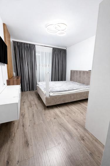 Apartament 2 camere cu parcare și curte proprie - 1