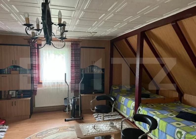Casa de lemn cu teren generos 1500 mp in Cerghid, lini - 1
