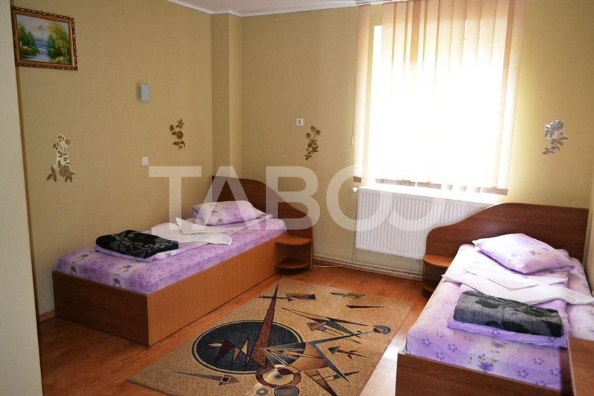 Pensiune de vanzare in Talmaciu judetul Sibiu renovata cu 26 camere - 26