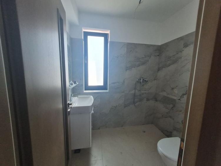 Vila cu 4 camere,2 bai,finisaje deosebite,curte 330 mp - 9