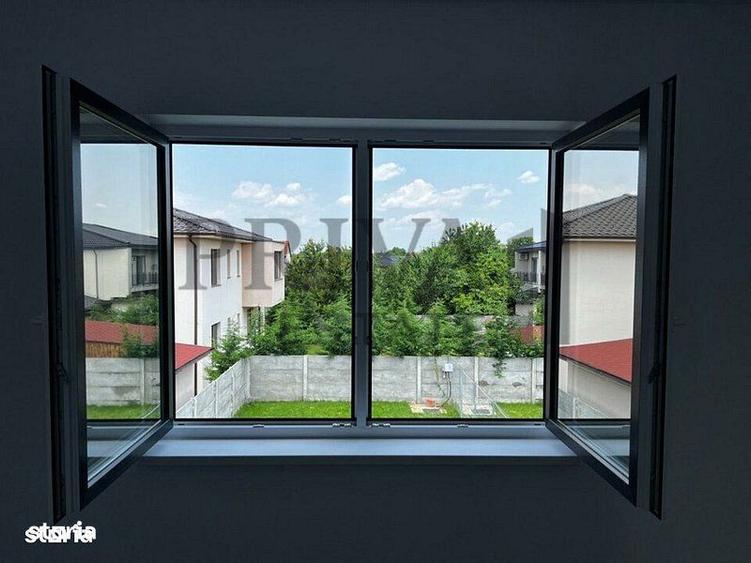 1/2 Duplex 124 mp utili + 330 curte. Dormitor parter,Bucatarie inchisa - 2