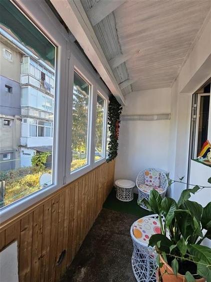 Apartament cu GRADINA SI ACOPERIS  MANSARDA DE VANZARE IN ONESTI ETJ 1 - 3