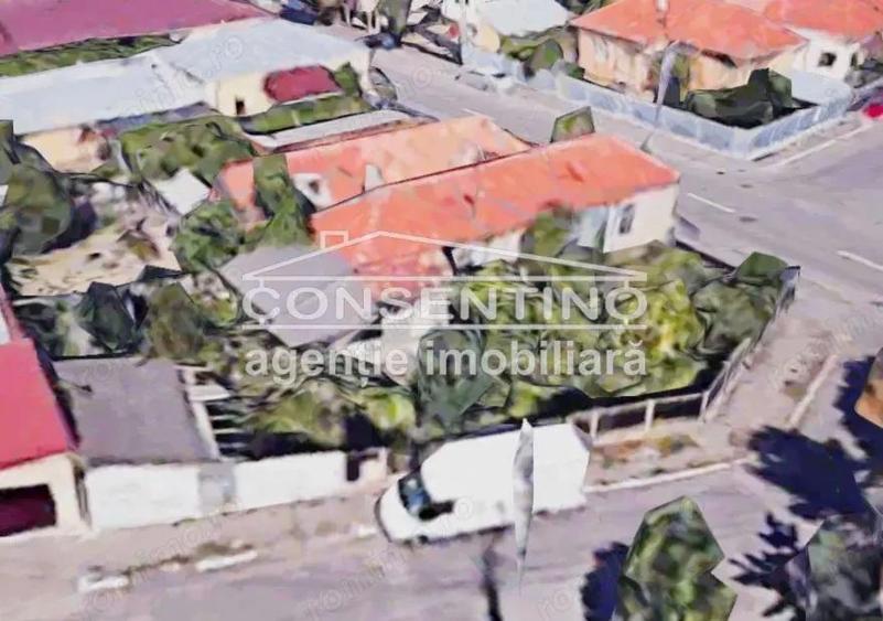 Se vinde teren 403 mp , cu imobil din 1960 , str. Patriei , Centru. - 2