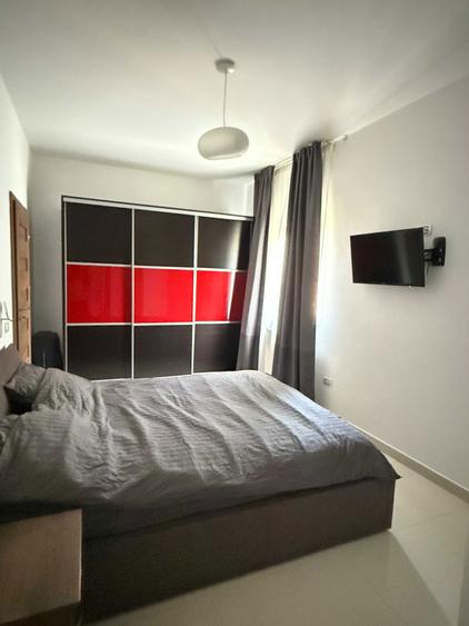 Apartament de inchiriat cu 2 camere si loc de parcare subteran, modern, spatios si luminos, situat intr-un bloc nou pe str. Caracal. - 2