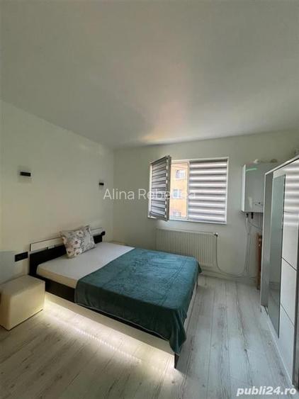 Alzza Real Estate  Garsoniera de Vanzare, Zona IRA