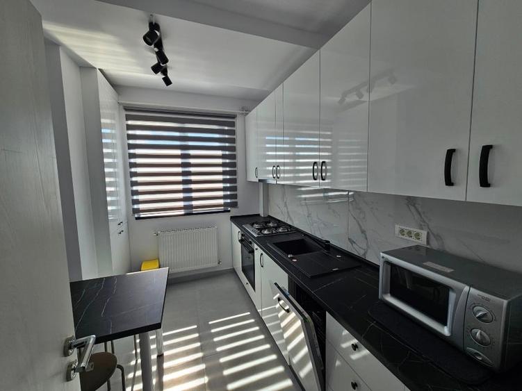 Apartament bloc nou 2 camere 70mp + parcare Bucureștii Noi / Pod Constanța - 10