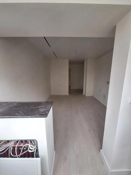 3 camere decomandate Baia Comunala etajul 1 - 4