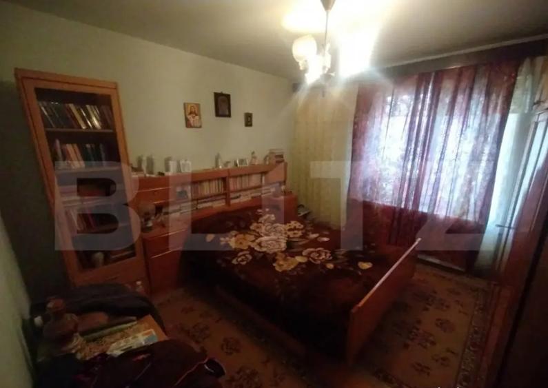 Apartament 3 camere,63mp,decomandat,parter inalt,zona noua,B - 2