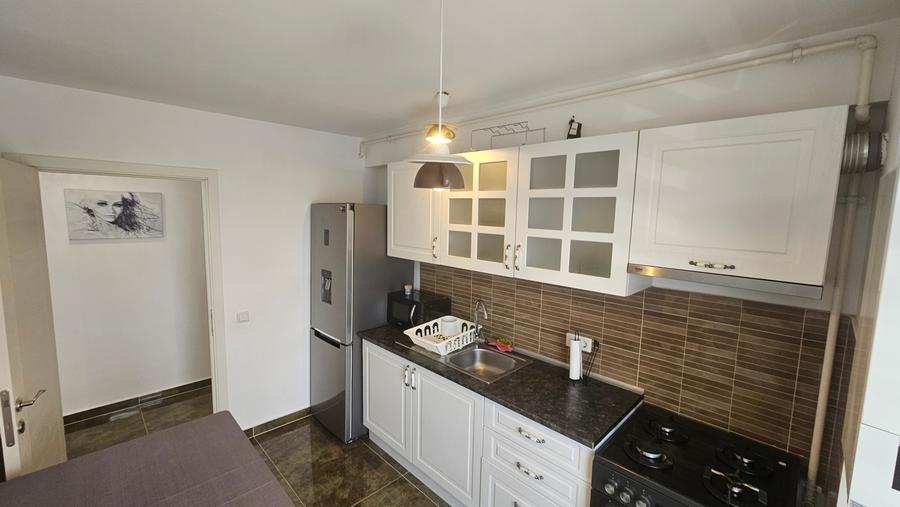 APARTAMENT 2 camere+Terasa 25mp. zona Otopeni bloc NOU - 17