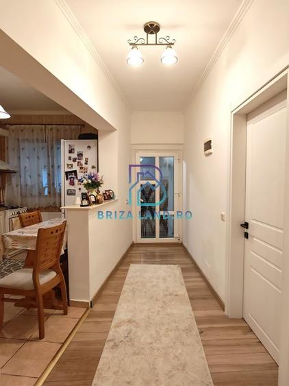 Bucurestii Noi, bd. 16 Februarie, imobil P+E, Parter, sup. 56mp, curte - 1