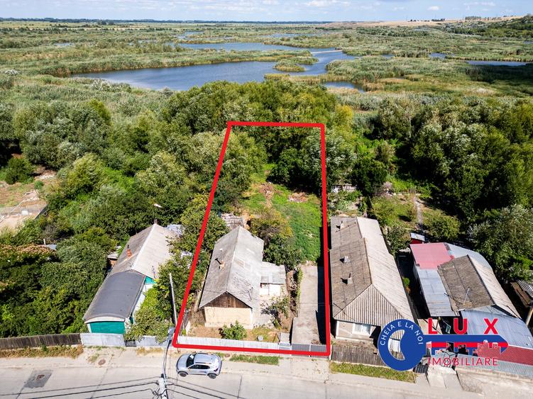 ID 7854 EXCLUSIVITATE – Teren cu casă și ieșire la canal - 2