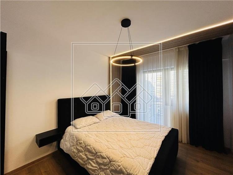 Apartament de inchiriat - 116 mp, 2 balcoane, parcare subterana - 13