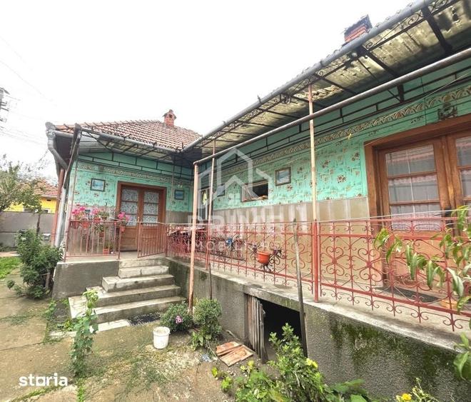 Casă cu 4 camere cu Teren 1000 Mp în Central