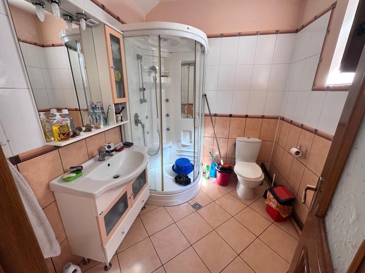 Casa individuala P+1+M amplasata pe un teren de 1612 mp. - 31