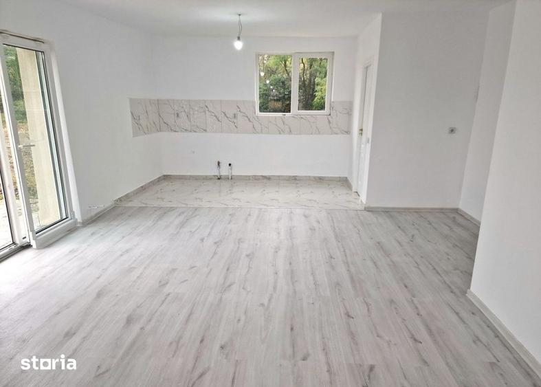 Casă cu 4 camere cu Teren 1000 Mp în Căianu
