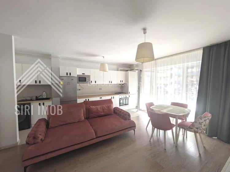 Apartament deosebit cu 2 camere,balcon generos, parcare subterana in Grand Park
