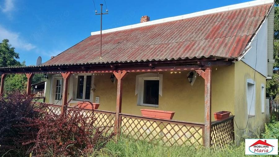 Casă în Apa