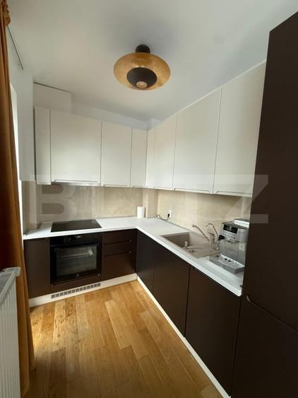 Apartament cu 2 camere semidecomandat, mobilat în Central