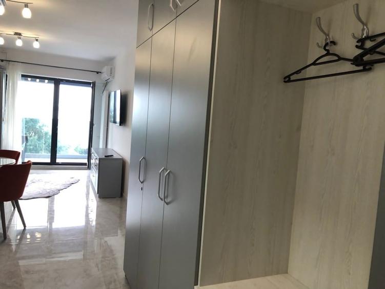 Apartament cu 2 camere semidecomandat, mobilat în Central