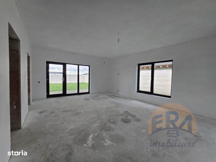 Casă cu 4 camere cu Teren 553 Mp în Centura