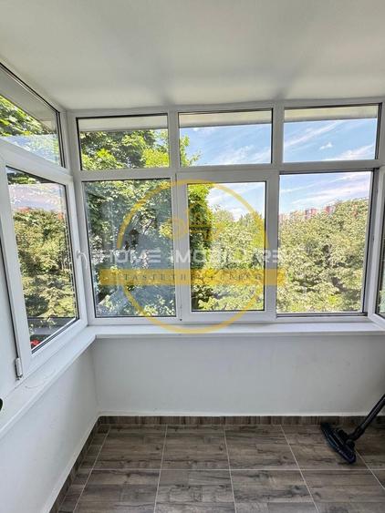 Apartament cu 2 camere semidecomandat, mobilat în Podu Roș