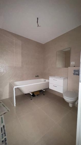 Apartament cu 3 camere decomandat în 2 Moldoveni