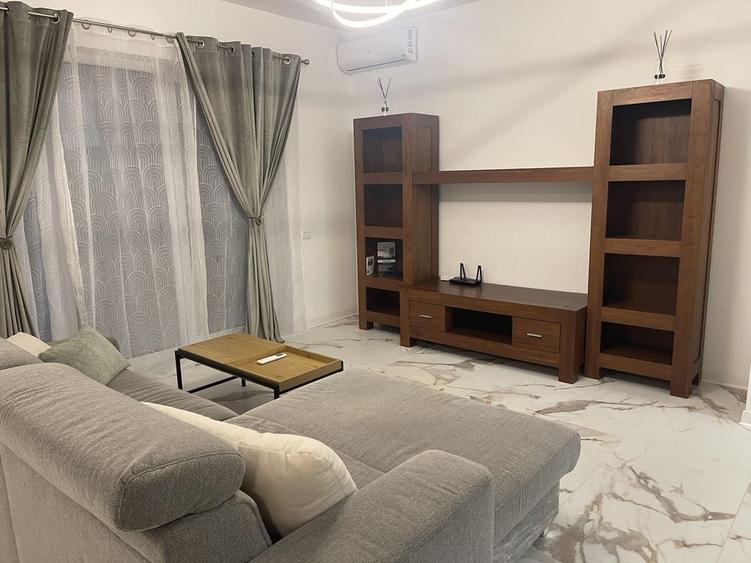 Apartament cu 2 camere decomandat în Sânmartin