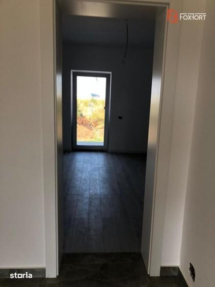 Casă cu 4 camere cu Teren 302 Mp în Plopi