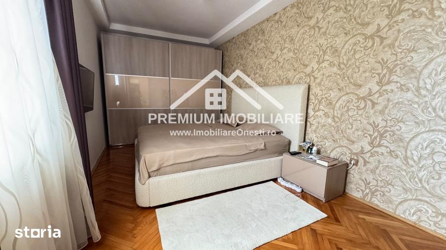 Apartament spa?ios cu 3 camere One?ti, zona centrala - 13