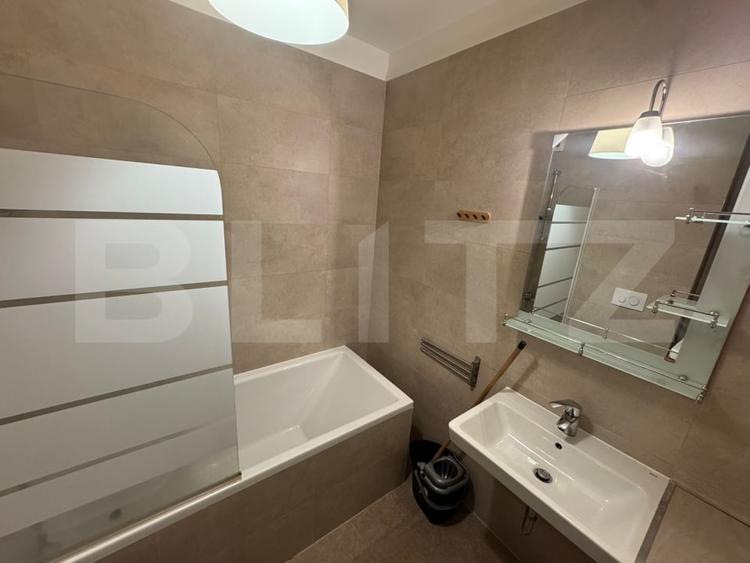 Apartament cu 2 camere semidecomandat, mobilat în Tractorul