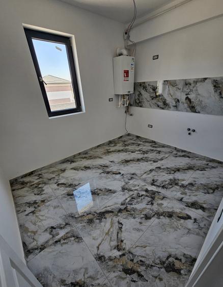 Apartament cu 2 camere decomandat în Haliu