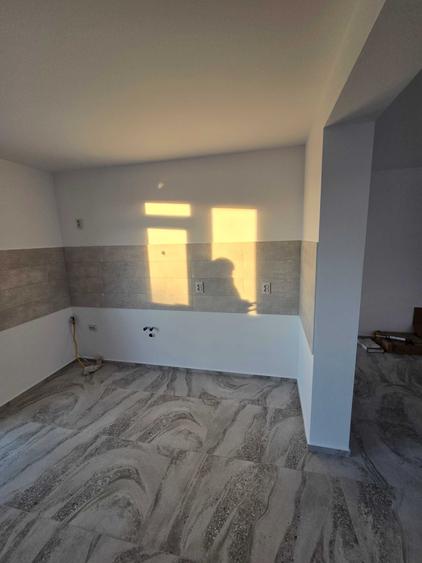 Casă cu 4 camere în Sântandrei