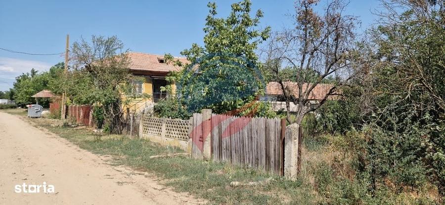 Casă cu 4 camere în Bâzdâna
