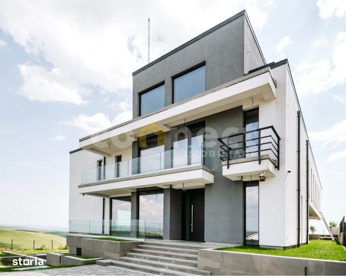 Casă cu 5 camere decomandat cu Teren 1900 Mp în Borhanci