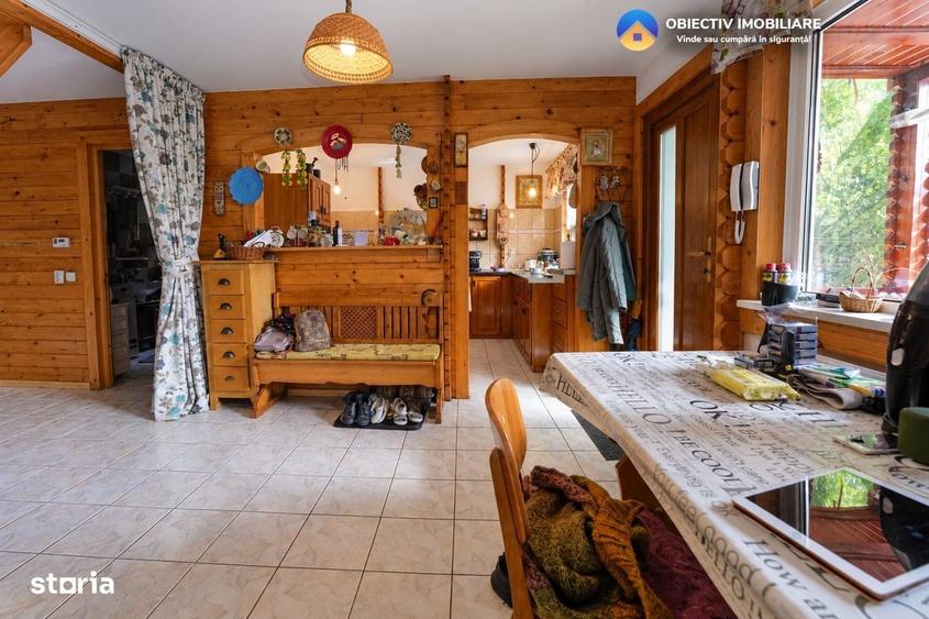 Casa din lemn P+M 191 mp, teren 2.199 mp, Almas - Garcina, zona retras - 2