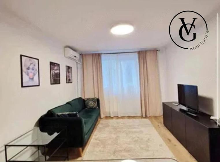 Apartament cu 2 camere decomandat în Arcul de Triumf
